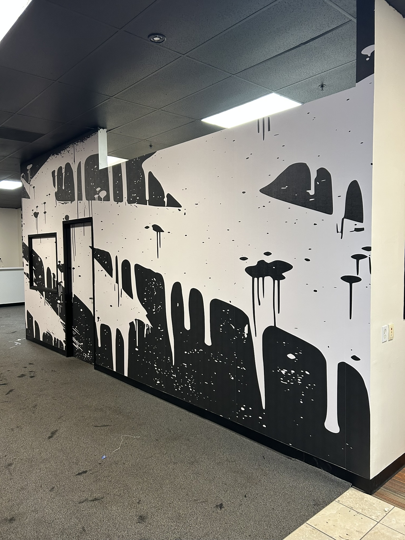 Black and white graffiti wall wrap angle 1