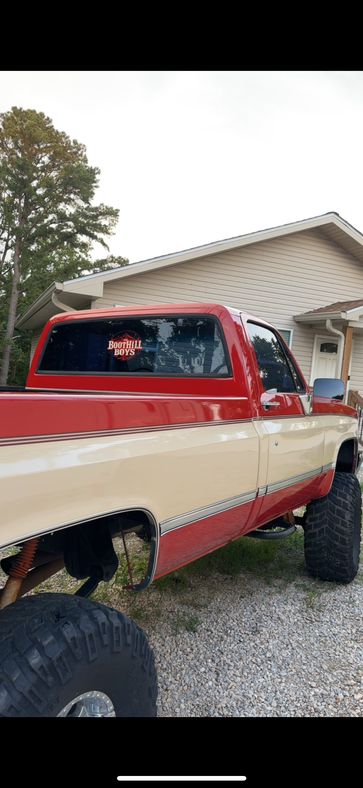 Square body Chevy truck with Boothill Boys window decal