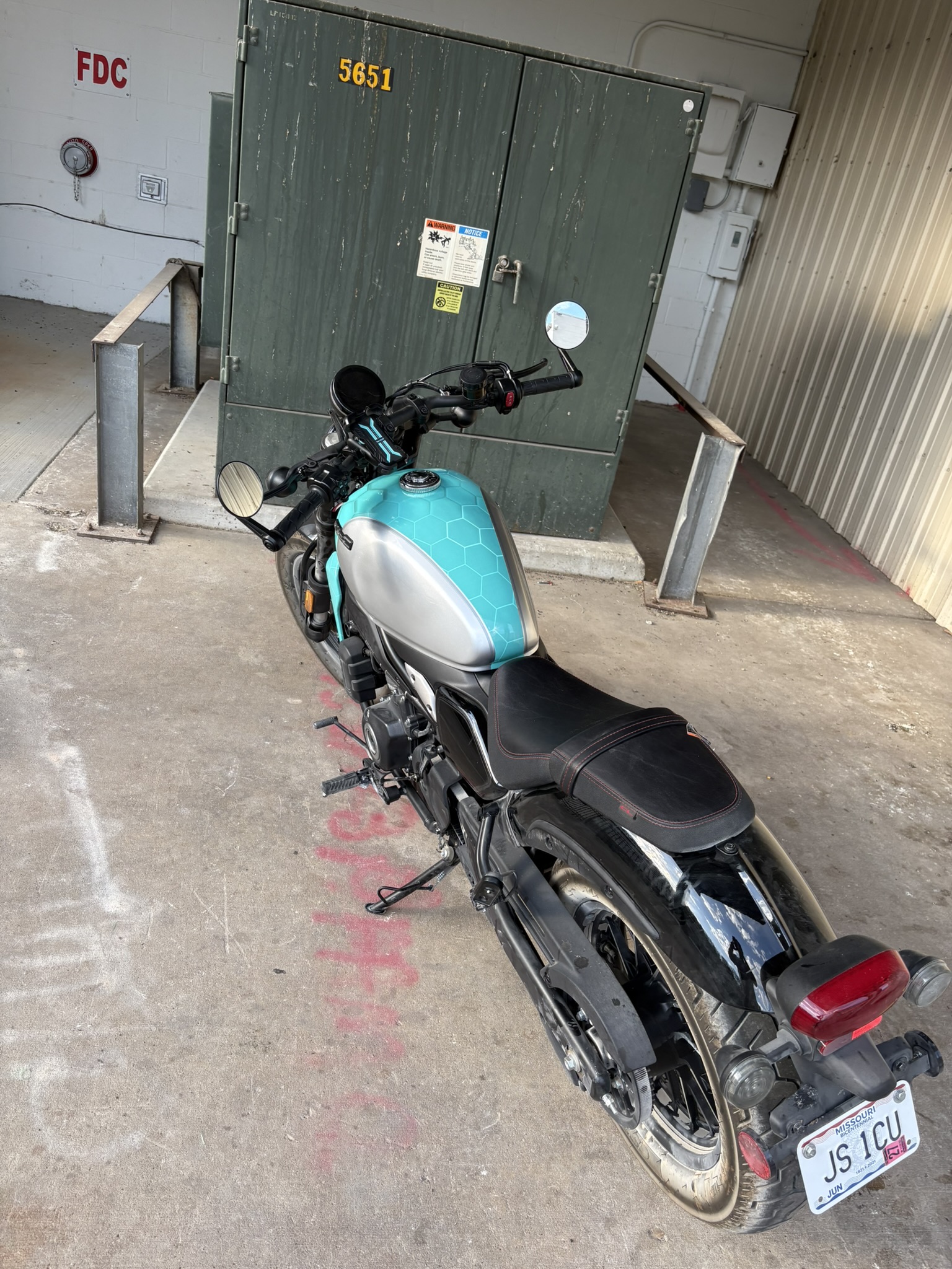 Honda motorcycle rear teal wrap after